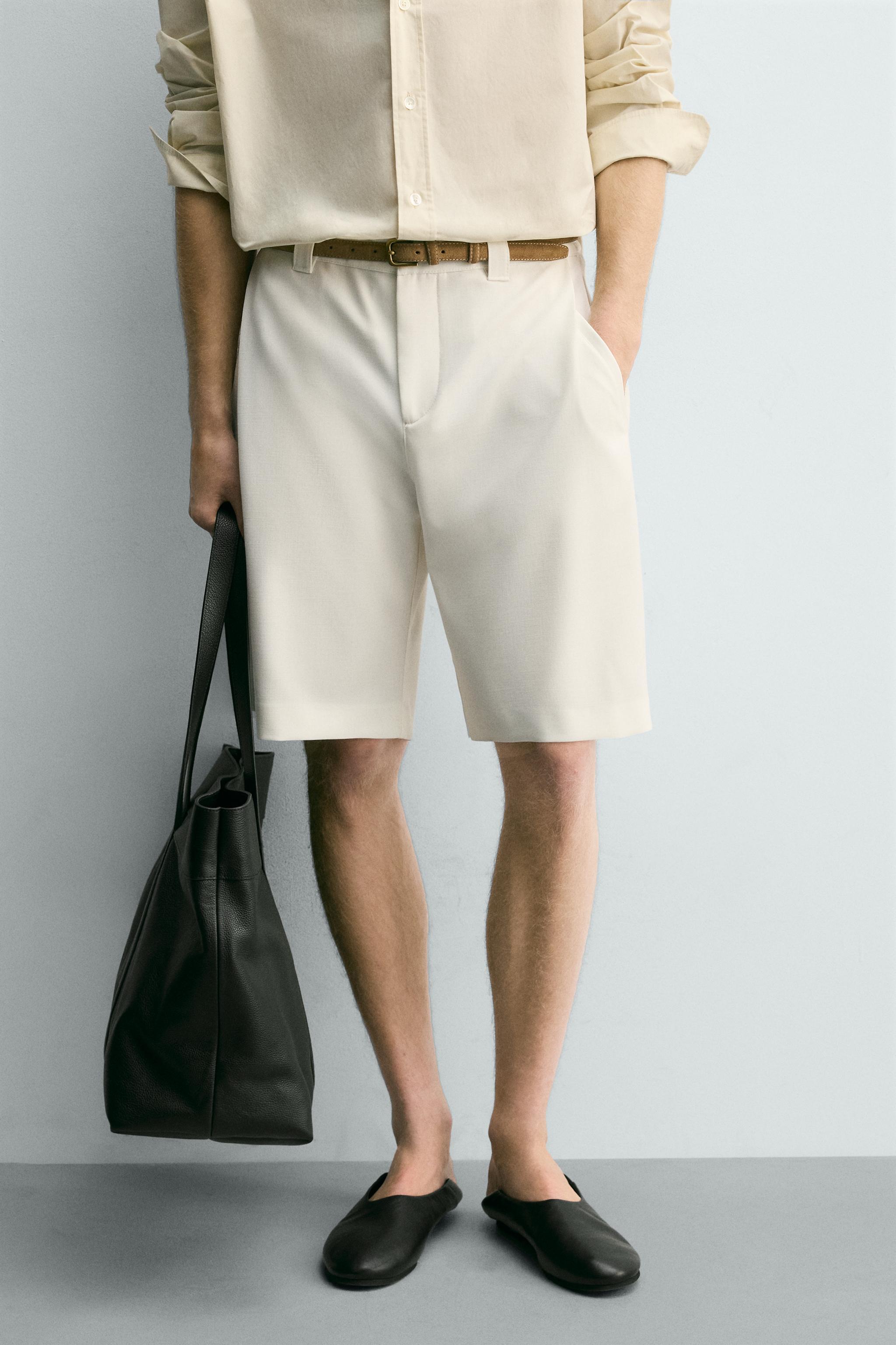 BERMUDA RELAXED FIT PLIS LATÉRAUX
